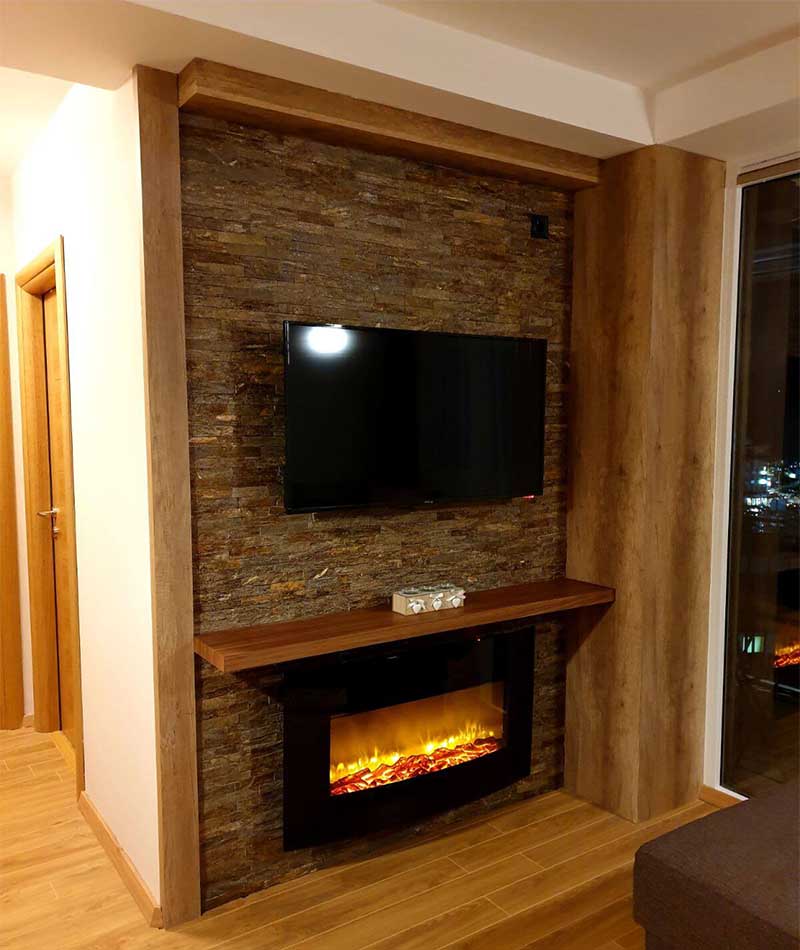 Flat-screen TV and fireplace